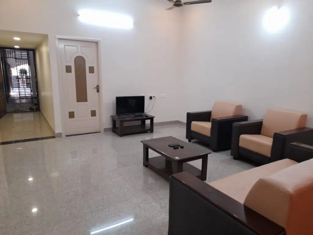 TV at the HALL at Shunmuga Bhavanam, eco-friendly guest house Thiruchendur